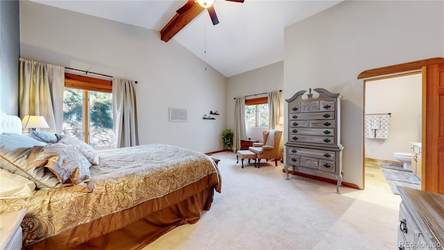 bedroom with beam ceiling, ceiling fan, light carpet, and multiple windows