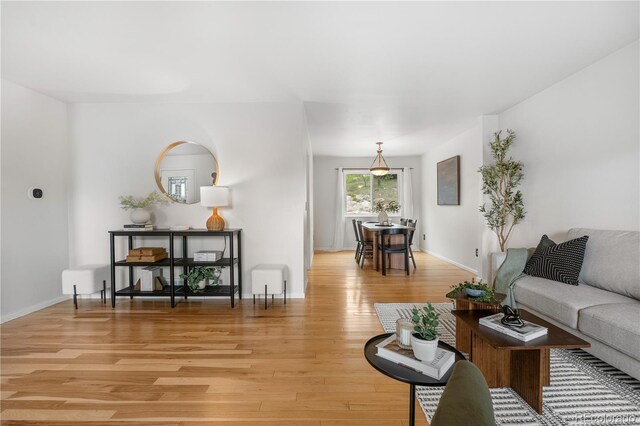 229 Berthoud Way, Golden, CO 80401 - living room featuring light wood finished floors and baseboards