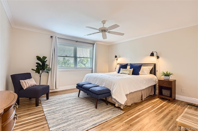 702 Windmill Pl, Highlands Ranch, CO 80126 - bedroom featuring crown molding, light wood-style flooring, and a ceiling fan