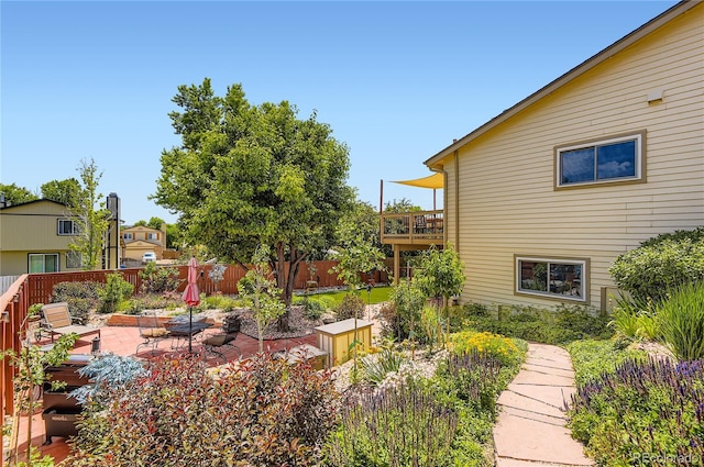 702 Windmill Pl, Highlands Ranch, CO 80126 - fenced backyard with a patio area and a deck
