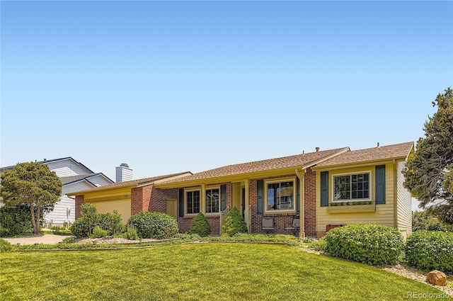 702 Windmill Pl, Highlands Ranch, CO 80126 - ranch-style home with brick siding, a front yard, and an attached garage