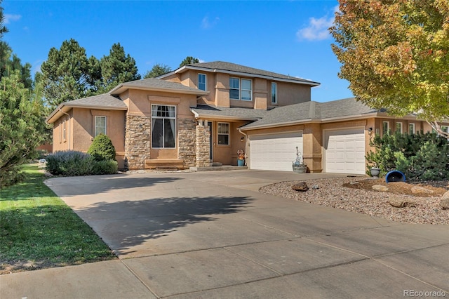 prairie-style house featuring a garage