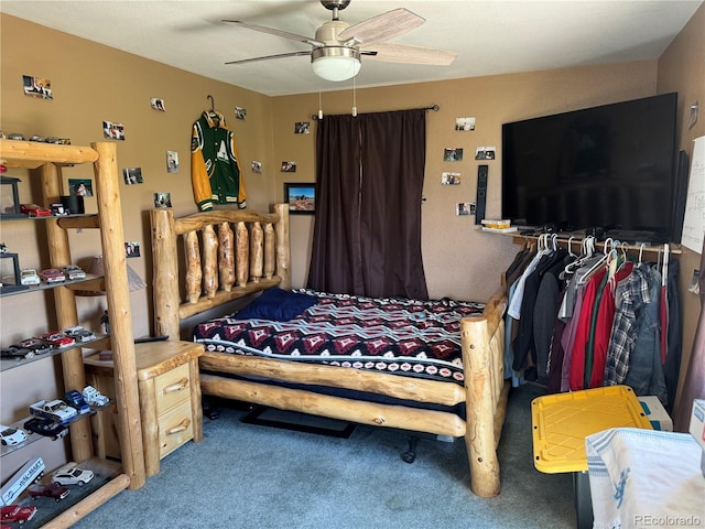 bedroom with ceiling fan and carpet flooring