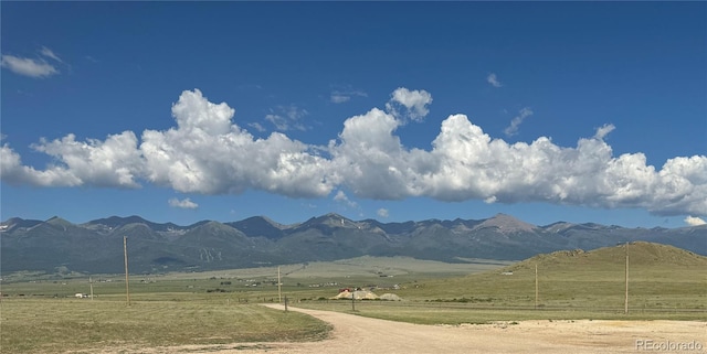 view of mountain feature with a rural view