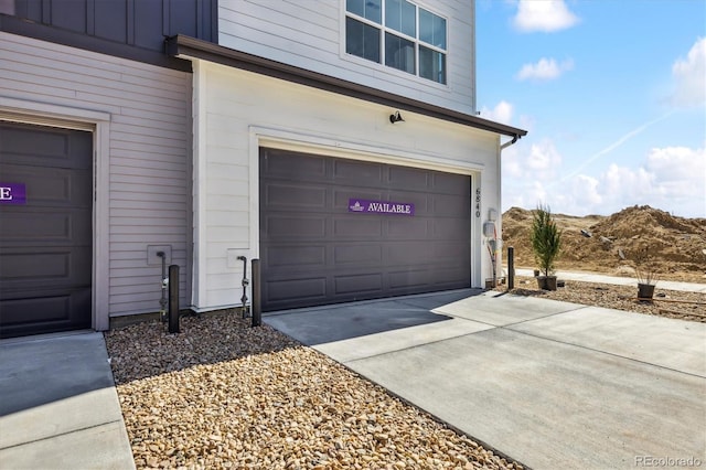 garage with driveway