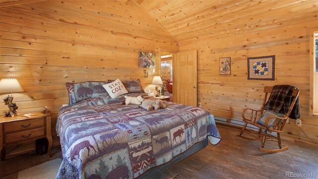 155 Squilchuck Trl, Woodland Park, CO 80863 - bedroom with wood walls, wood ceiling, wood finished floors, and vaulted ceiling