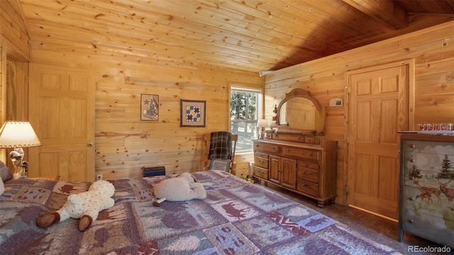 155 Squilchuck Trl, Woodland Park, CO 80863 - bedroom featuring wooden walls, lofted ceiling with beams, carpet floors, and wood ceiling