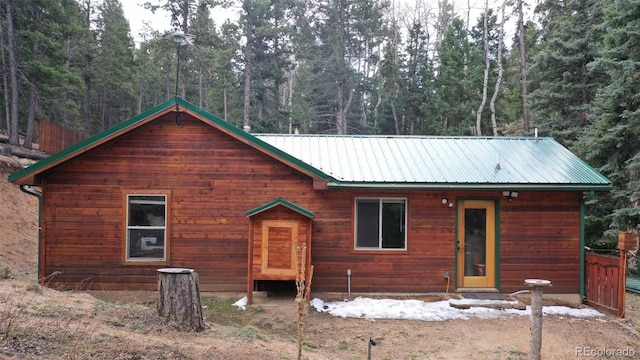 155 Squilchuck Trl, Woodland Park, CO 80863 - rustic home with a forest view and metal roof