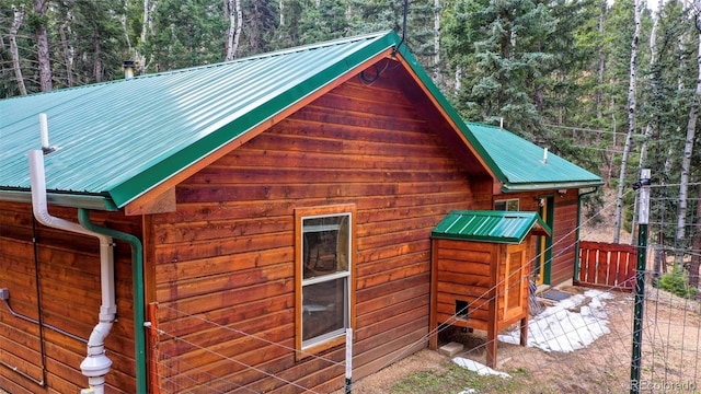 155 Squilchuck Trl, Woodland Park, CO 80863 - view of home's exterior with a forest view and metal roof