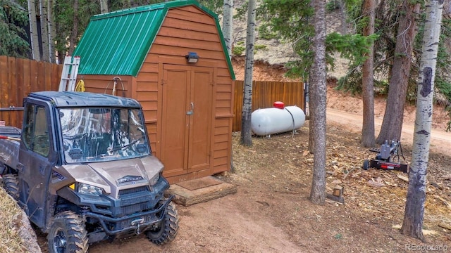 155 Squilchuck Trl, Woodland Park, CO 80863 - view of outbuilding featuring fence and an outbuilding