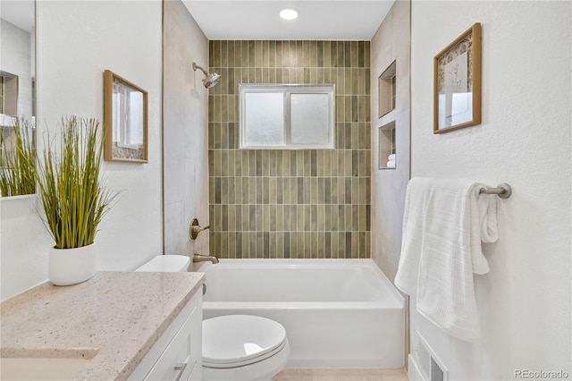 2701 Barnhart St, Thornton, CO 80229 - full bathroom featuring vanity, toilet, and washtub / shower combination