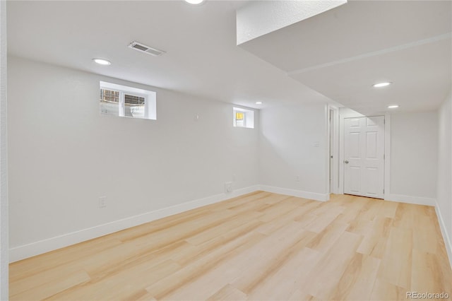 2701 Barnhart St, Thornton, CO 80229 - below grade area with recessed lighting, wood finished floors, and baseboards