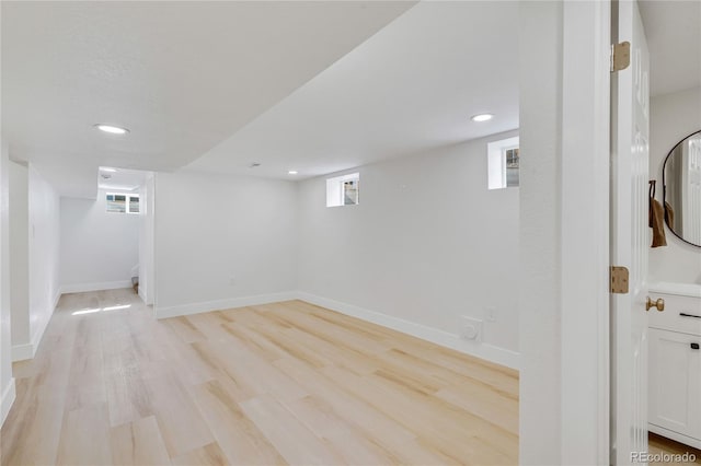 2701 Barnhart St, Thornton, CO 80229 - below grade area featuring light wood-style flooring, plenty of natural light, recessed lighting, and baseboards