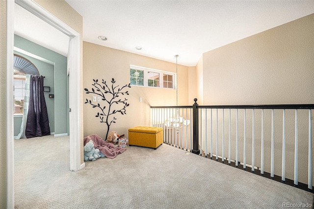 12051 E Lake Cir, Greenwood Village, CO 80111 - rec room with carpet and a chandelier