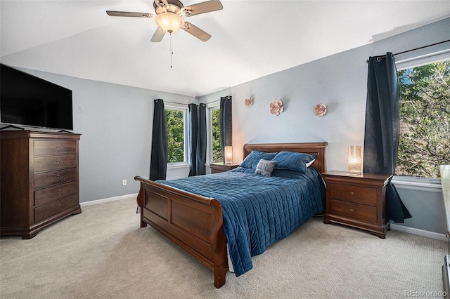 12051 E Lake Cir, Greenwood Village, CO 80111 - bedroom with light colored carpet, ceiling fan, and lofted ceiling