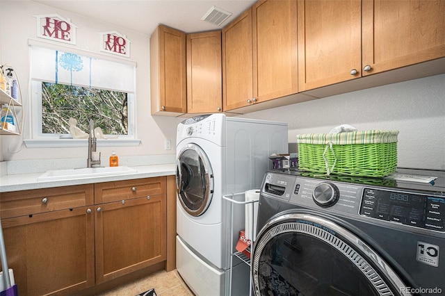 12051 E Lake Cir, Greenwood Village, CO 80111 - washroom featuring independent washer and dryer and cabinet space