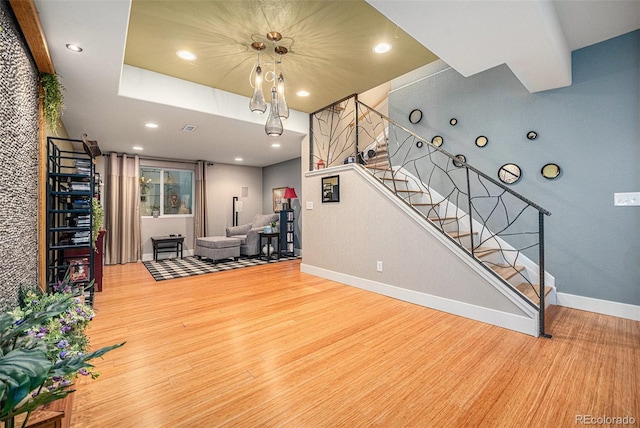 12051 E Lake Cir, Greenwood Village, CO 80111 - living area featuring wood finished floors, stairs, and recessed lighting