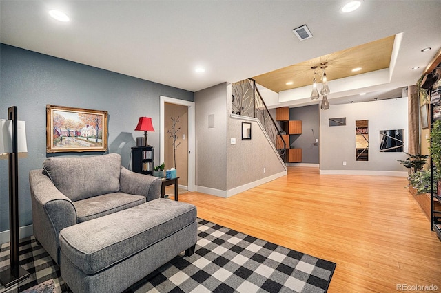 12051 E Lake Cir, Greenwood Village, CO 80111 - living area featuring wood finished floors, stairs, and recessed lighting