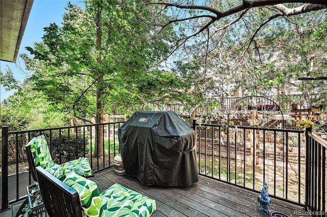 12051 E Lake Cir, Greenwood Village, CO 80111 - wooden deck featuring area for grilling
