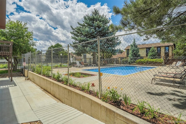 view of pool featuring a patio area