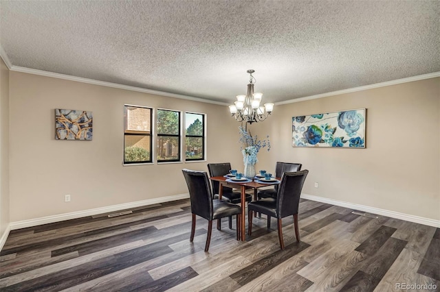 dining space with crown molding, a textured ceiling, an inviting chandelier, and dark hardwood / wood-style floors