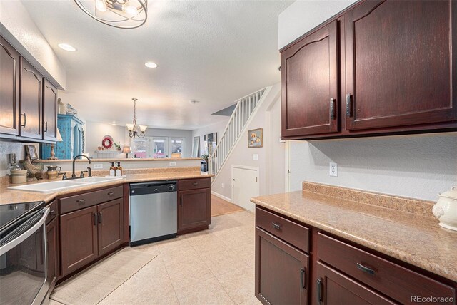 5252 W 68th Ave, Arvada, CO 80003 - kitchen with dishwasher, a peninsula, light countertops, a sink, and recessed lighting