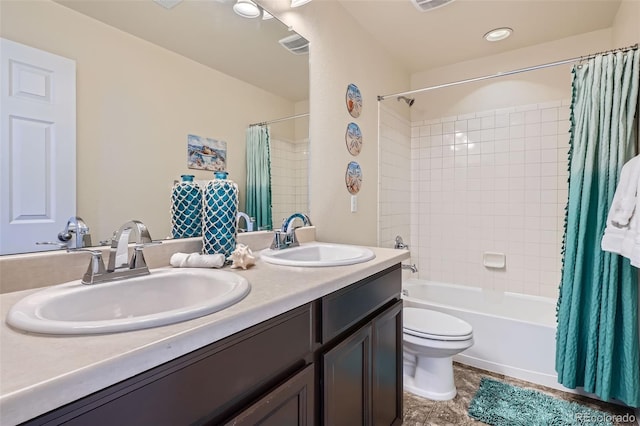 7485 S Jackson Gap Way, Aurora, CO 80016 - bathroom featuring shower / bath combo, toilet, and double vanity