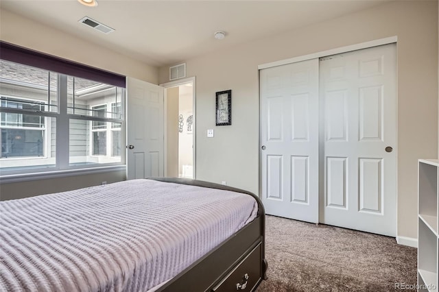 7485 S Jackson Gap Way, Aurora, CO 80016 - carpeted bedroom with a closet and baseboards