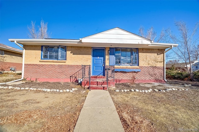 bungalow with brick siding