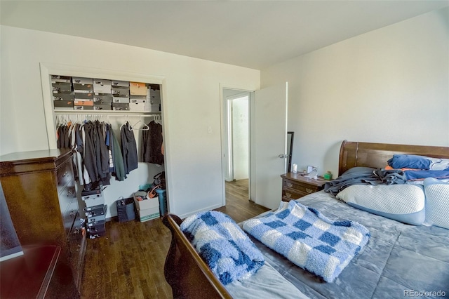 bedroom featuring a closet and wood finished floors