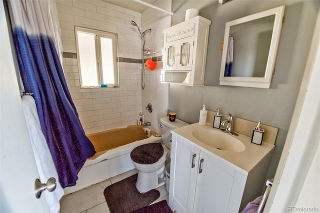 full bath with vanity, tile patterned flooring, toilet, and shower / bathtub combination with curtain