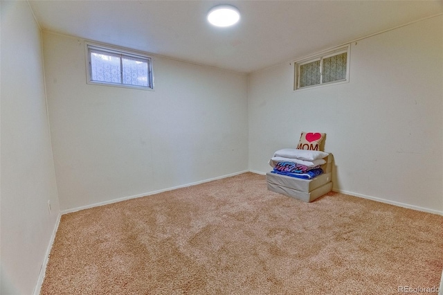 basement with carpet floors and baseboards