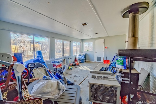 sunroom featuring visible vents