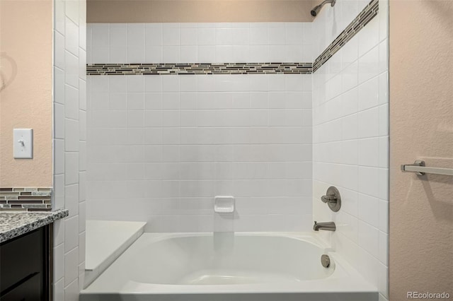 bathroom with vanity and  shower combination