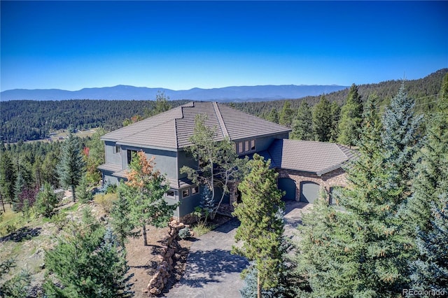 28154 Belle Mont Trl, Conifer, CO 80433 - view of mountain backdrop with a heavily wooded area
