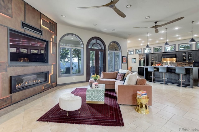 28154 Belle Mont Trl, Conifer, CO 80433 - living area featuring a ceiling fan, recessed lighting, and a large fireplace