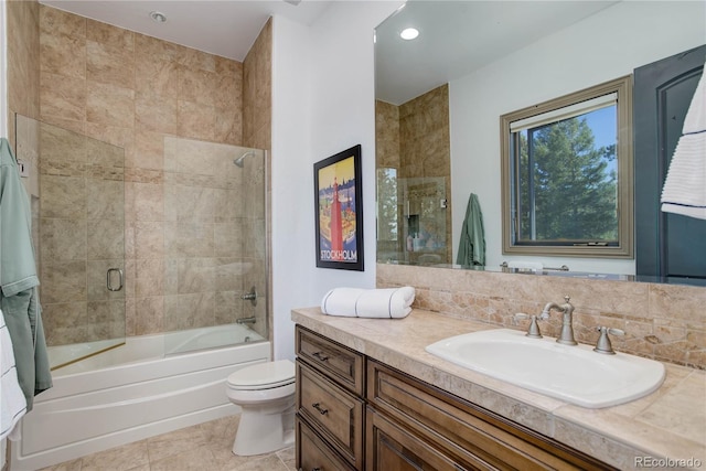 28154 Belle Mont Trl, Conifer, CO 80433 - bathroom featuring vanity, toilet, shower / tub combination, tile patterned floors, and recessed lighting