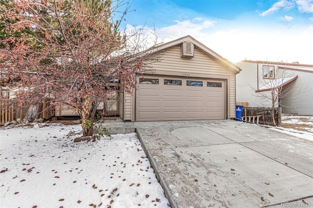 view of snow covered garage