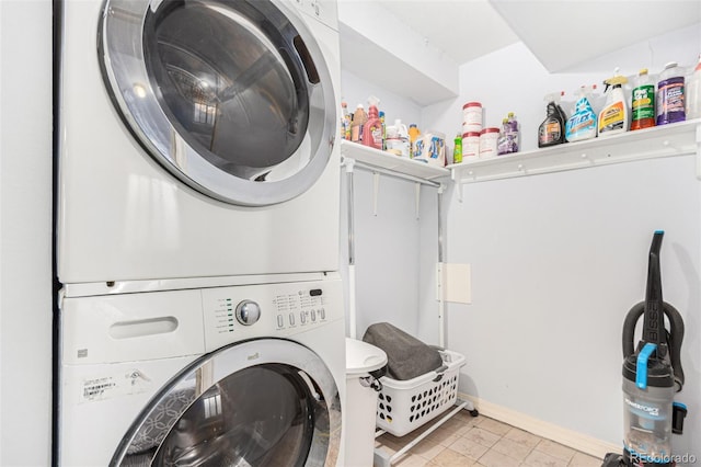 laundry room featuring stacked washer and dryer