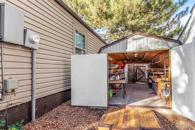 view of patio / terrace featuring a storage unit