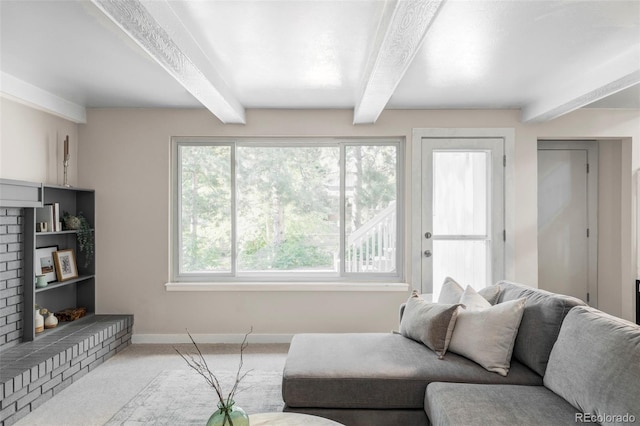 4821 W 102nd Ave, Westminster, CO 80031 - living room featuring beamed ceiling, carpet flooring, and a brick fireplace