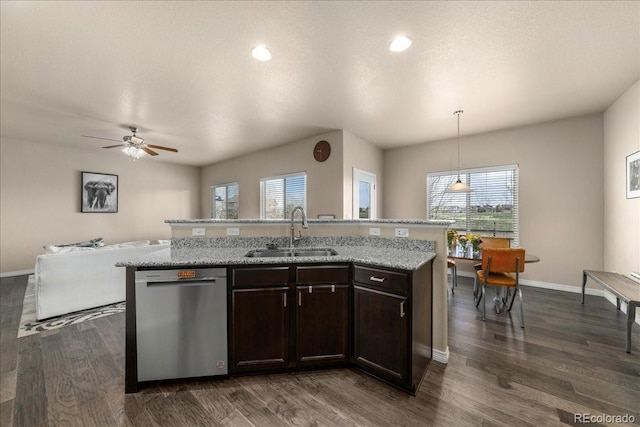 kitchen with stainless steel dishwasher, ceiling fan, a healthy amount of sunlight, and a sink