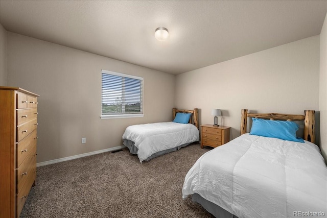 carpeted bedroom with baseboards