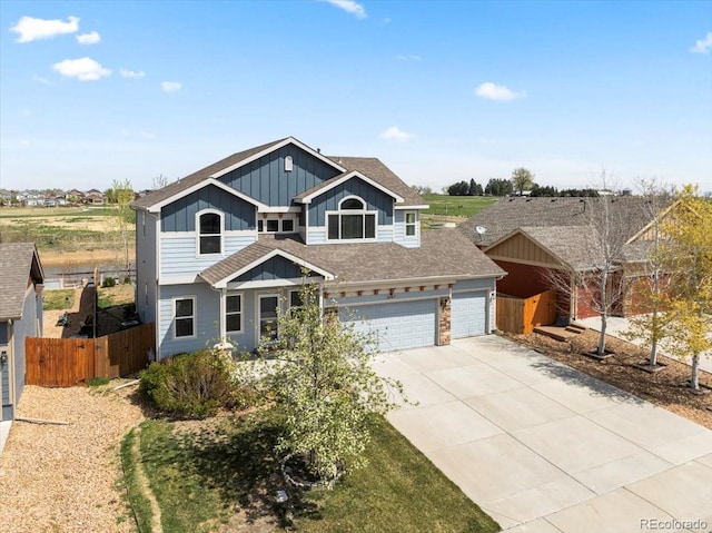 2757 Stallion Way, Mead, CO 80542 - craftsman-style home featuring board and batten siding, concrete driveway, and roof with shingles