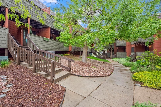 surrounding community featuring stairway