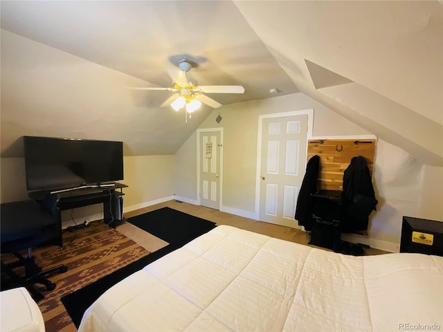 bedroom featuring ceiling fan and lofted ceiling