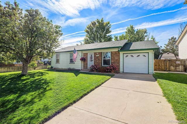 ranch-style house with a garage and a front lawn