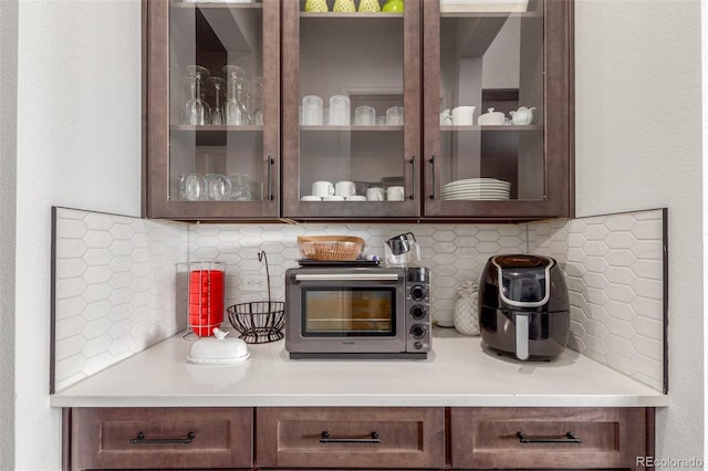 bar with a toaster and backsplash