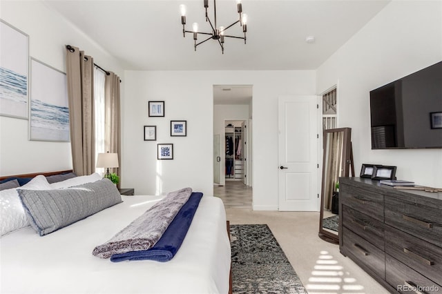 bedroom featuring an inviting chandelier, light colored carpet, and baseboards