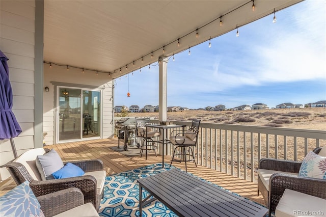 exterior space with an outdoor living space and a wooden deck